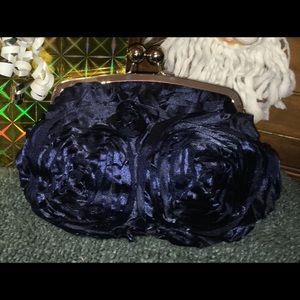 Dark blue rosesette clutch
